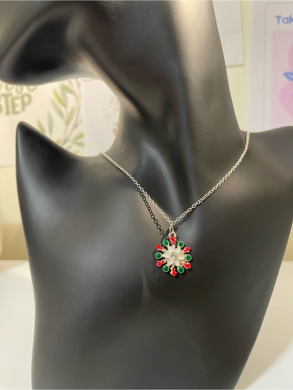 Silver Floral Pendant Necklace with Red and Green Accents